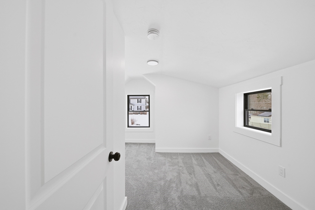 26 Rivulet Street Uxbridge, MA 01569 - Photo 25 of 41 a view of a hallway with closet