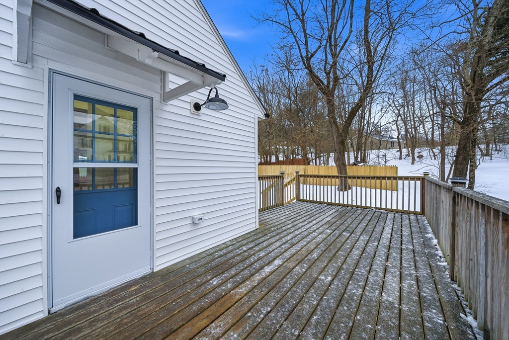 26 Rivulet Street Uxbridge, MA 01569 - Photo 35 of 41 a view of outdoor space with deck and living room