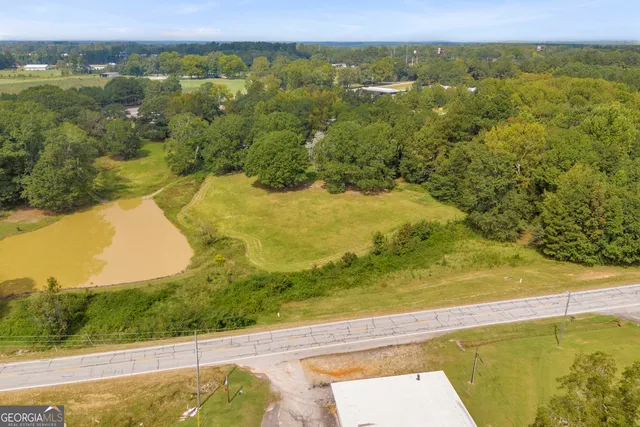 a view of a lake with a yard