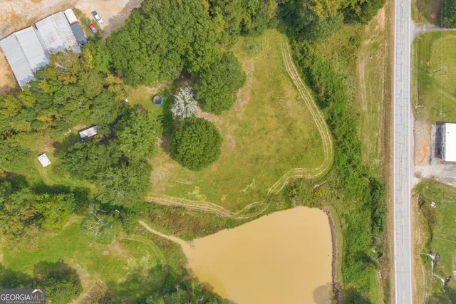 a view of a swimming pool with a lake view