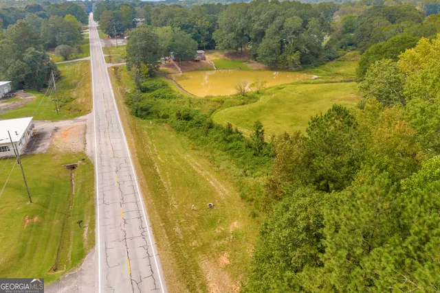 a view of a yard with a lake view