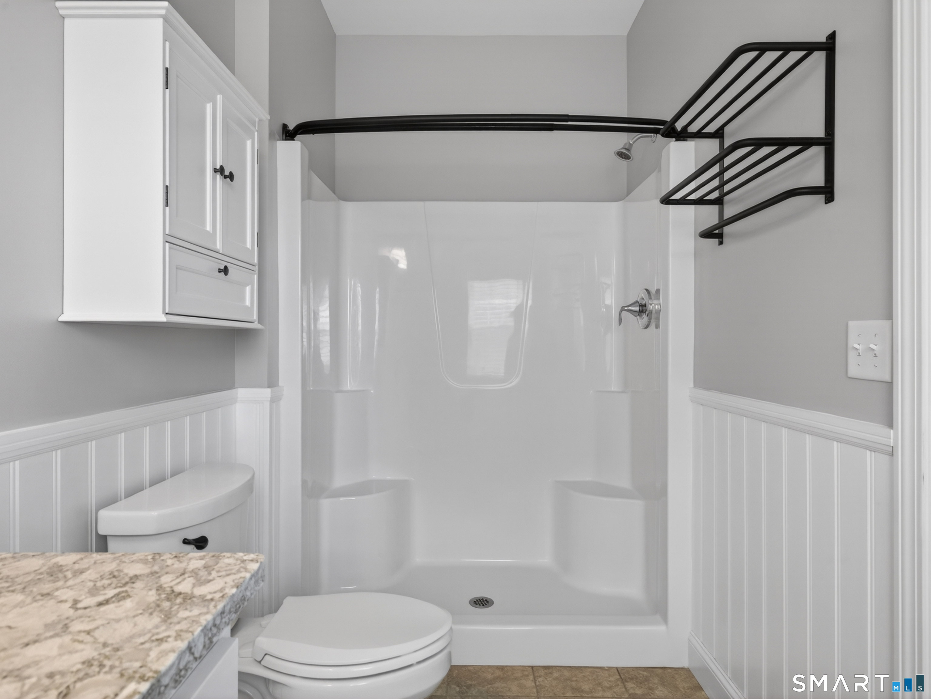 650 Ridgewood Road Middletown, CT 06457 - Photo 22 of 40 a bathroom with a granite countertop sink a toilet and shower
