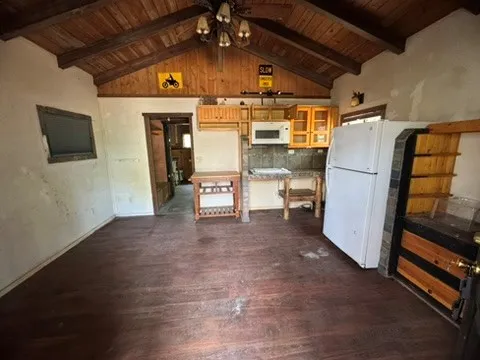a view of a storage & utility room with a sink