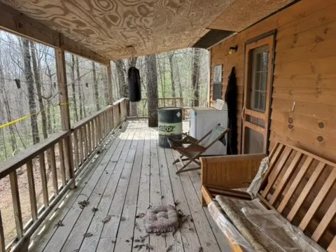 a view of balcony with furniture