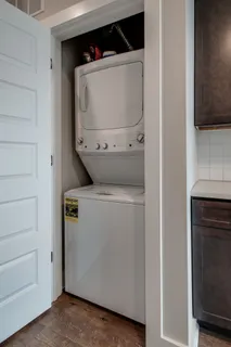 a front view of a building with a garden