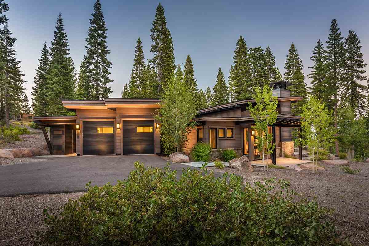8370 Valhalla Drive Truckee, CA 96161 - Photo 6 of 13 a front view of a house with a yard and trees