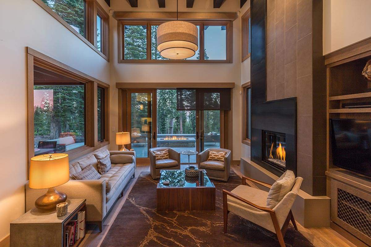 8370 Valhalla Drive Truckee, CA 96161 - Photo 8 of 13 a living room with furniture and a fireplace