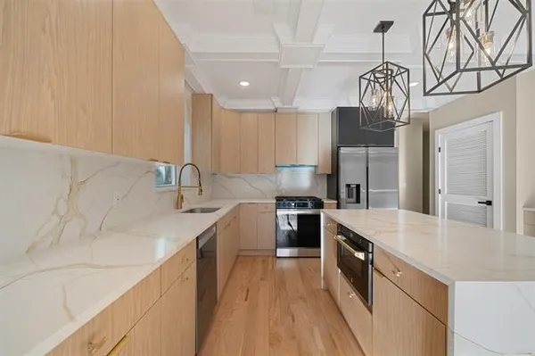 a aerial view of a house with a yard