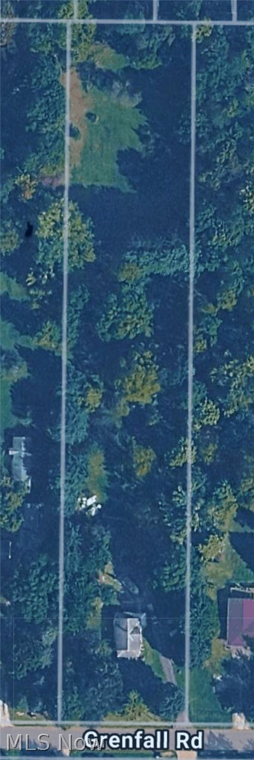 3187 Grenfall Road Barberton, OH 44203 - Photo 17 of 17 Aerial view of the property, featuring extensive tree cover and a portion of Grenfall Rd
