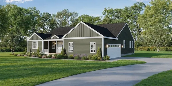 a front view of house with yard and green space