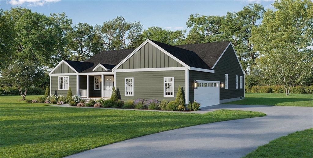a front view of house with yard and green space
