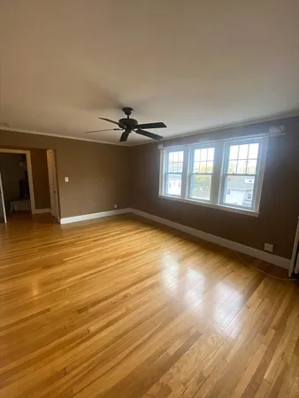 a view of an empty room and window