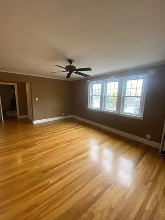 a view of an empty room and window