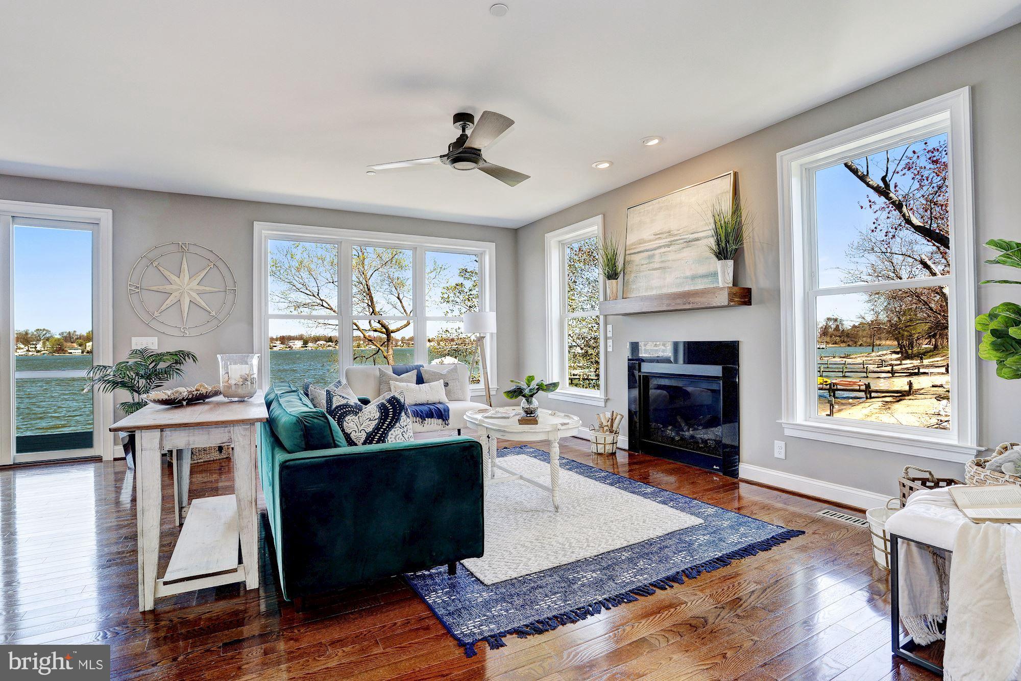 7680 Colonial Beach Road Pasadena, MD 21122 - Photo 11 of 53 Family Rm w/Water Views & Gas Fireplace