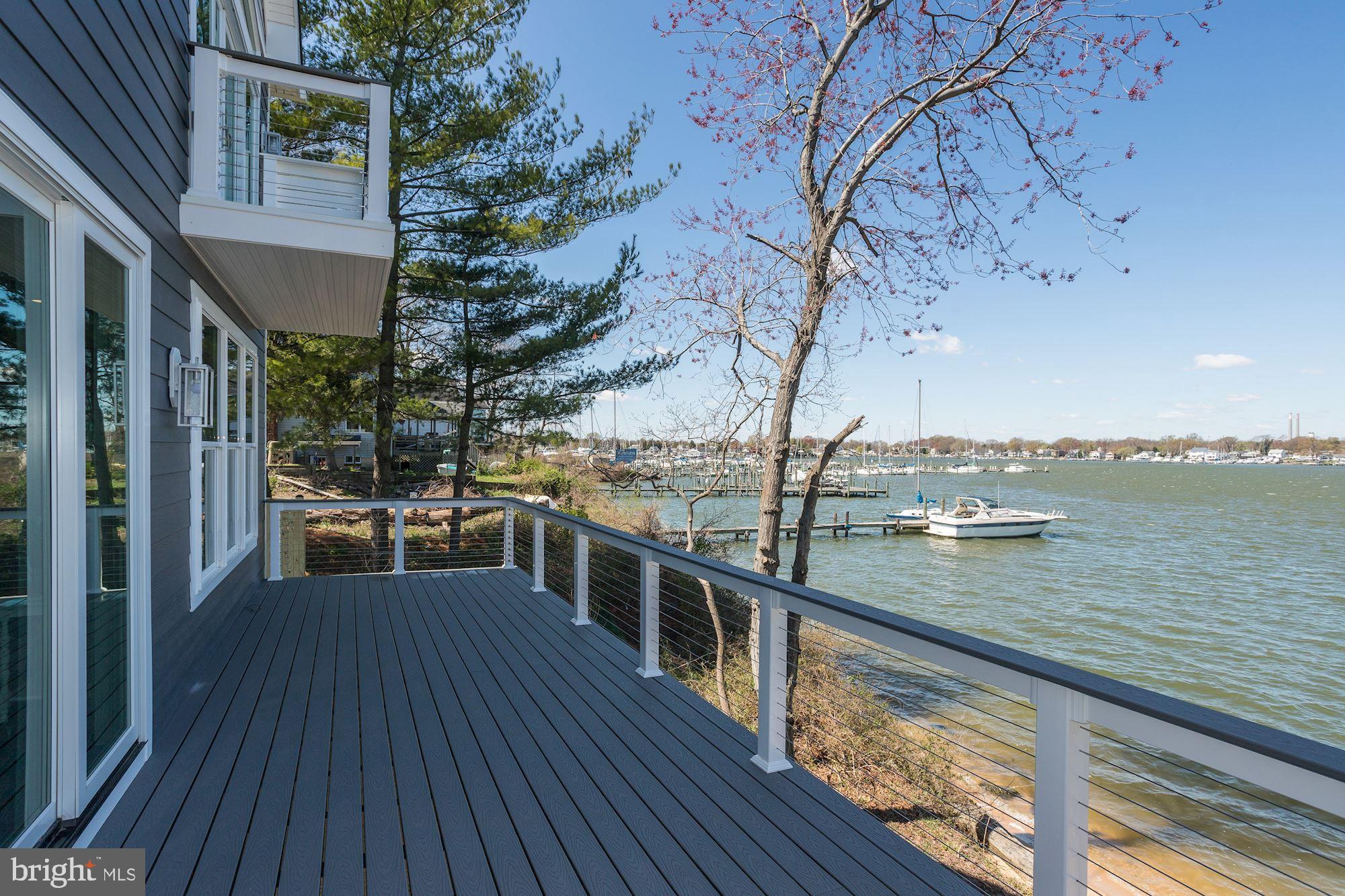 7680 Colonial Beach Road Pasadena, MD 21122 - Photo 25 of 53 Waterside Dining Deck & Master Balcony Above