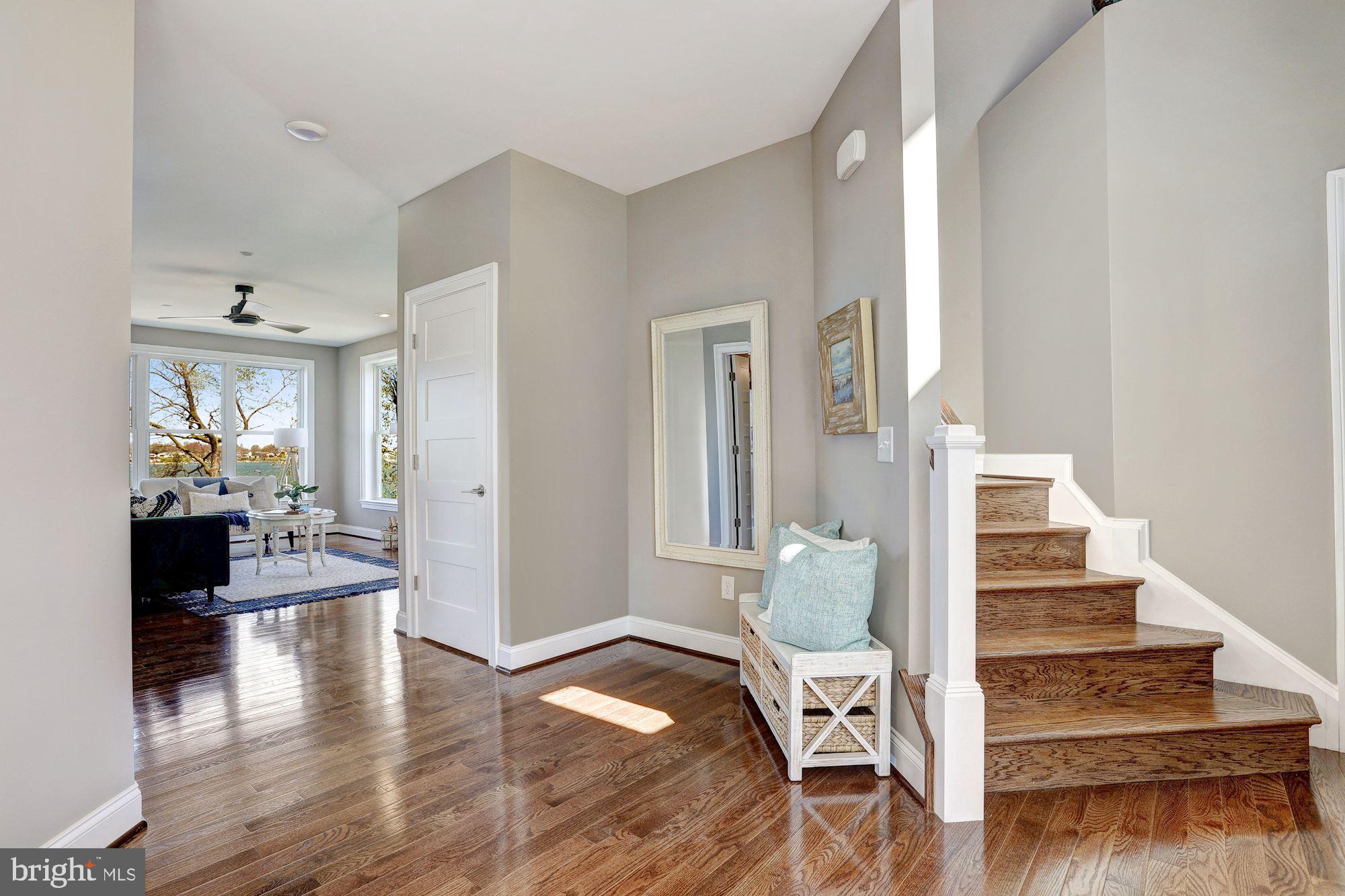 7680 Colonial Beach Road Pasadena, MD 21122 - Photo 27 of 53 Extended Foyer and Stair to Upper Level