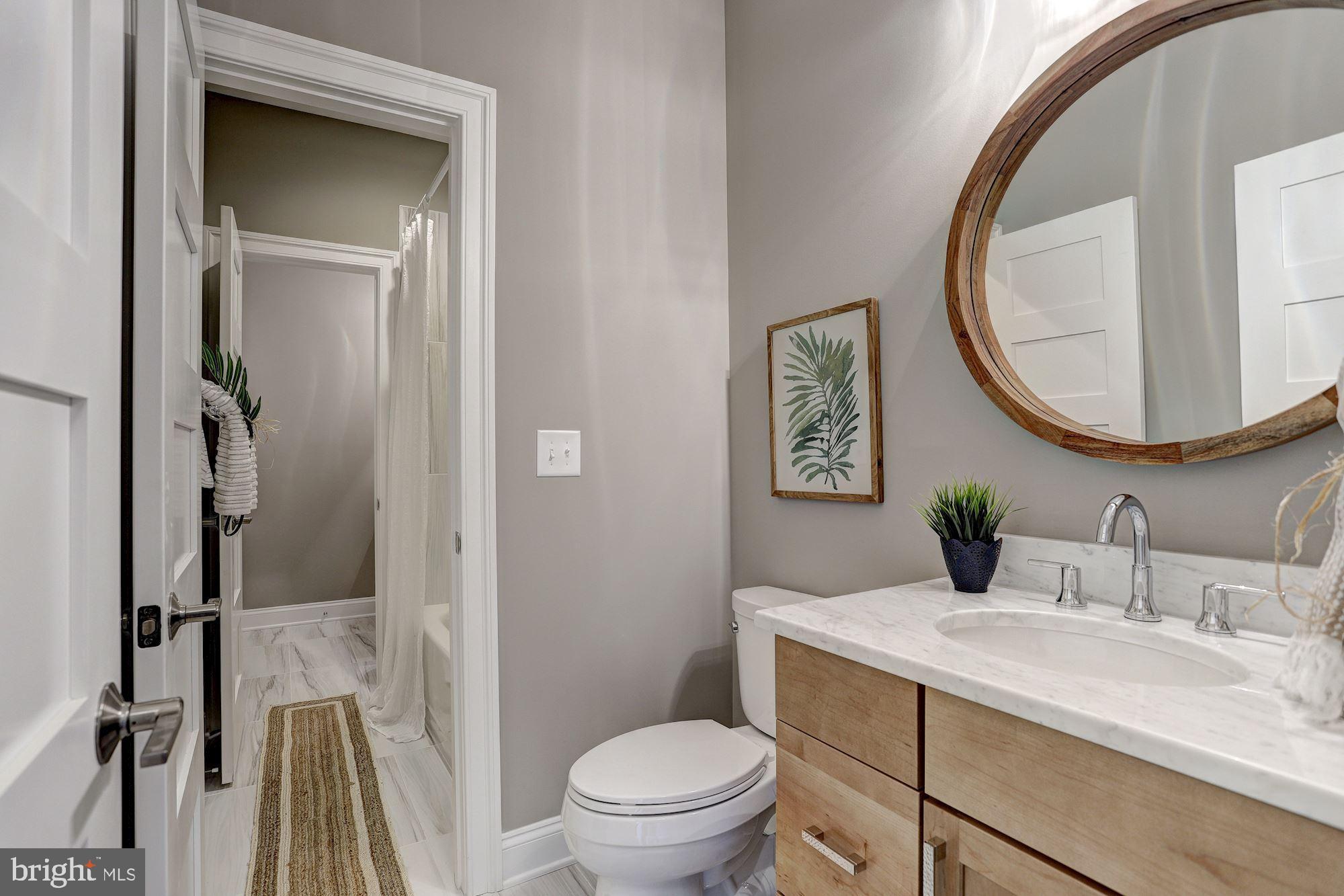 7680 Colonial Beach Road Pasadena, MD 21122 - Photo 39 of 53 Hall Bath w/ Dual Entry to Shower Area
