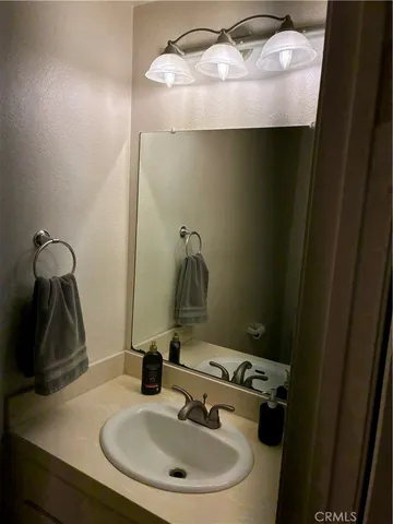 a view of multiple houses with a yard