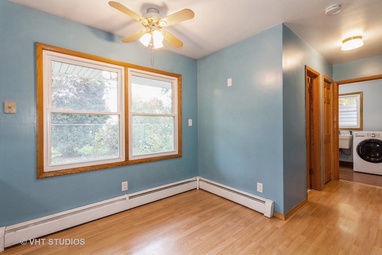 211 East Ottawa Street Sycamore, IL 60178 - Photo 11 of 33 a view of an empty room with a window and bathroom