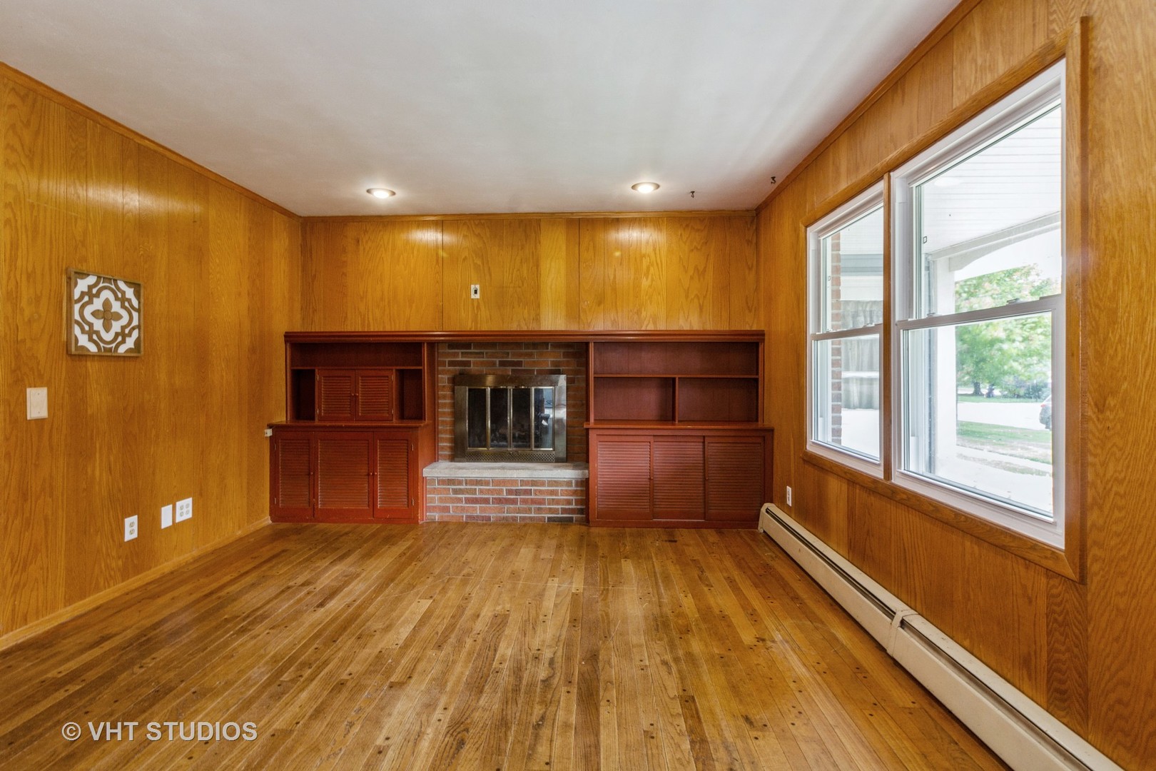 211 East Ottawa Street Sycamore, IL 60178 - Photo 13 of 33 a view of a room with wooden floor and staircase