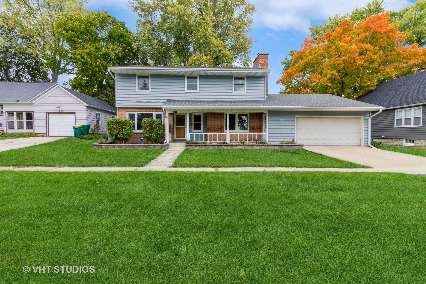 211 East Ottawa Street Sycamore, IL 60178 - Photo 2 of 33 a front view of house with yard and green space