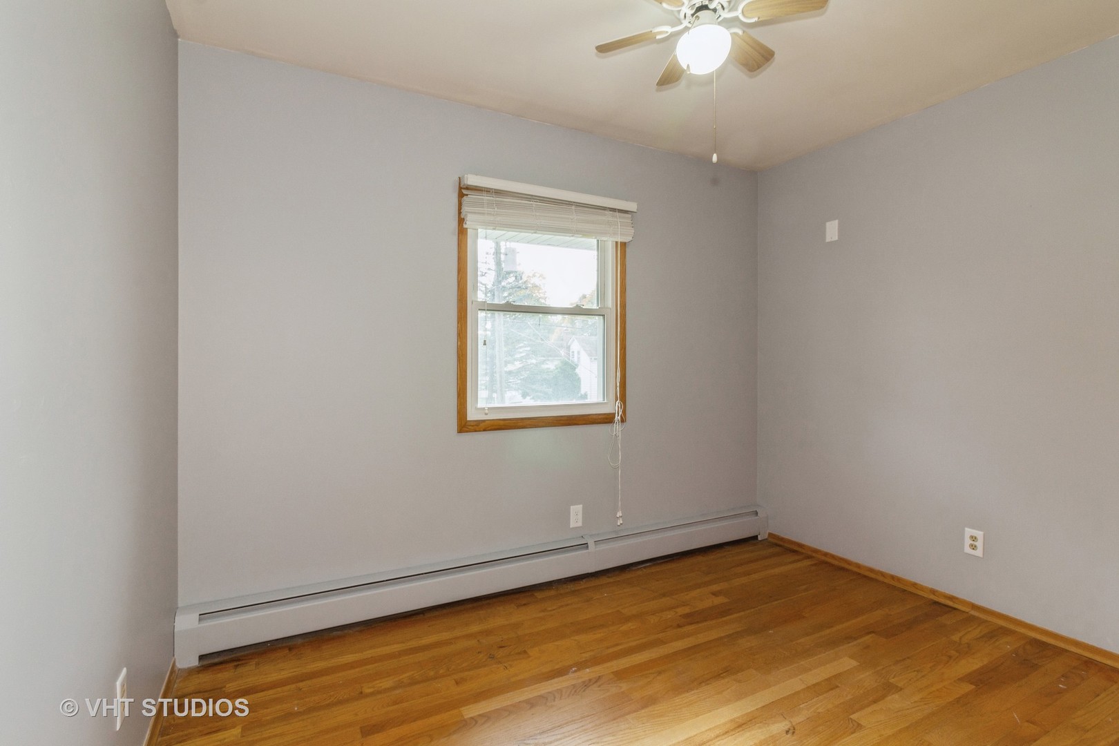 211 East Ottawa Street Sycamore, IL 60178 - Photo 23 of 33 an empty room with a window