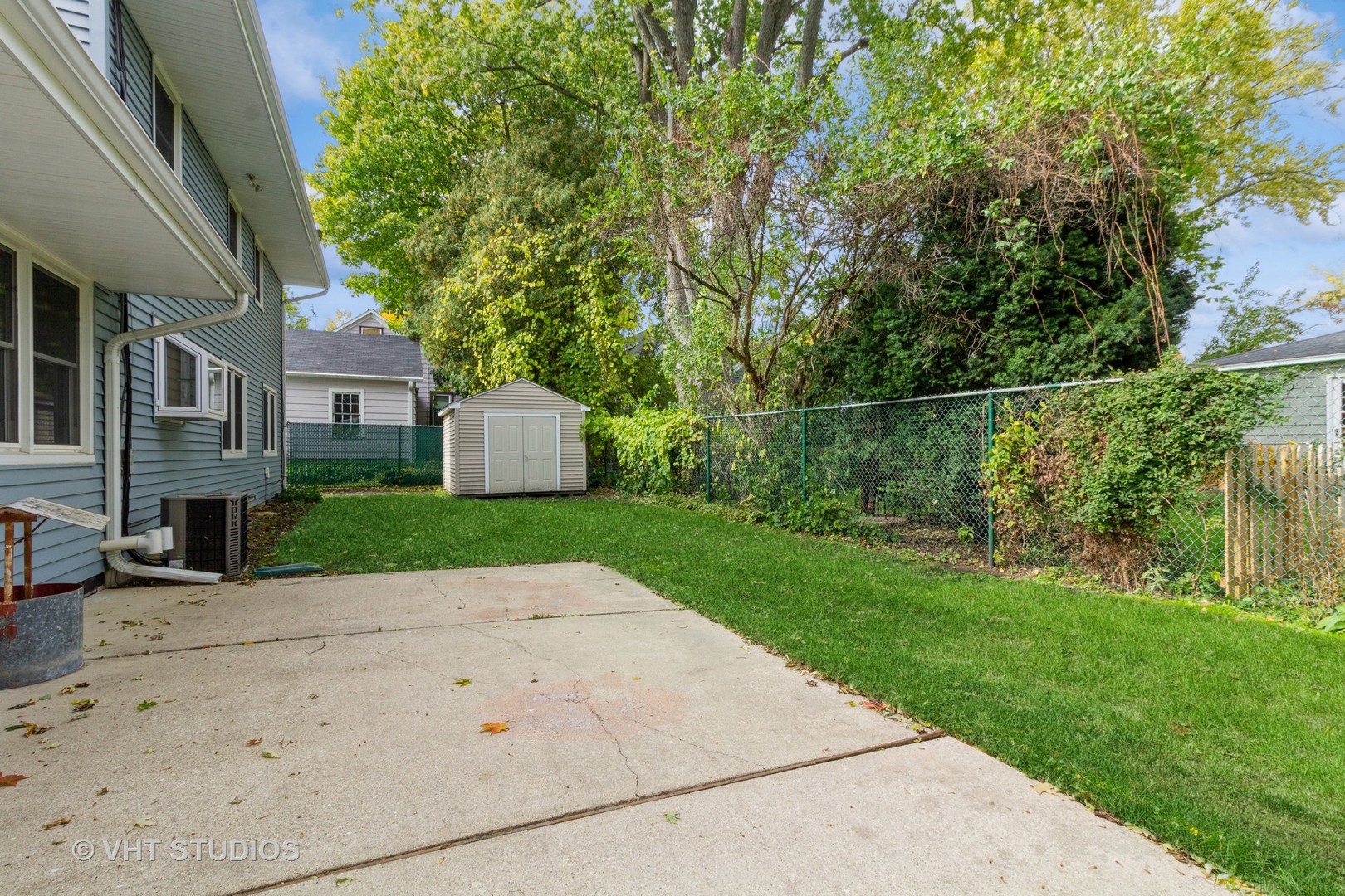 211 East Ottawa Street Sycamore, IL 60178 - Photo 31 of 33 a view of a brick house with a yard