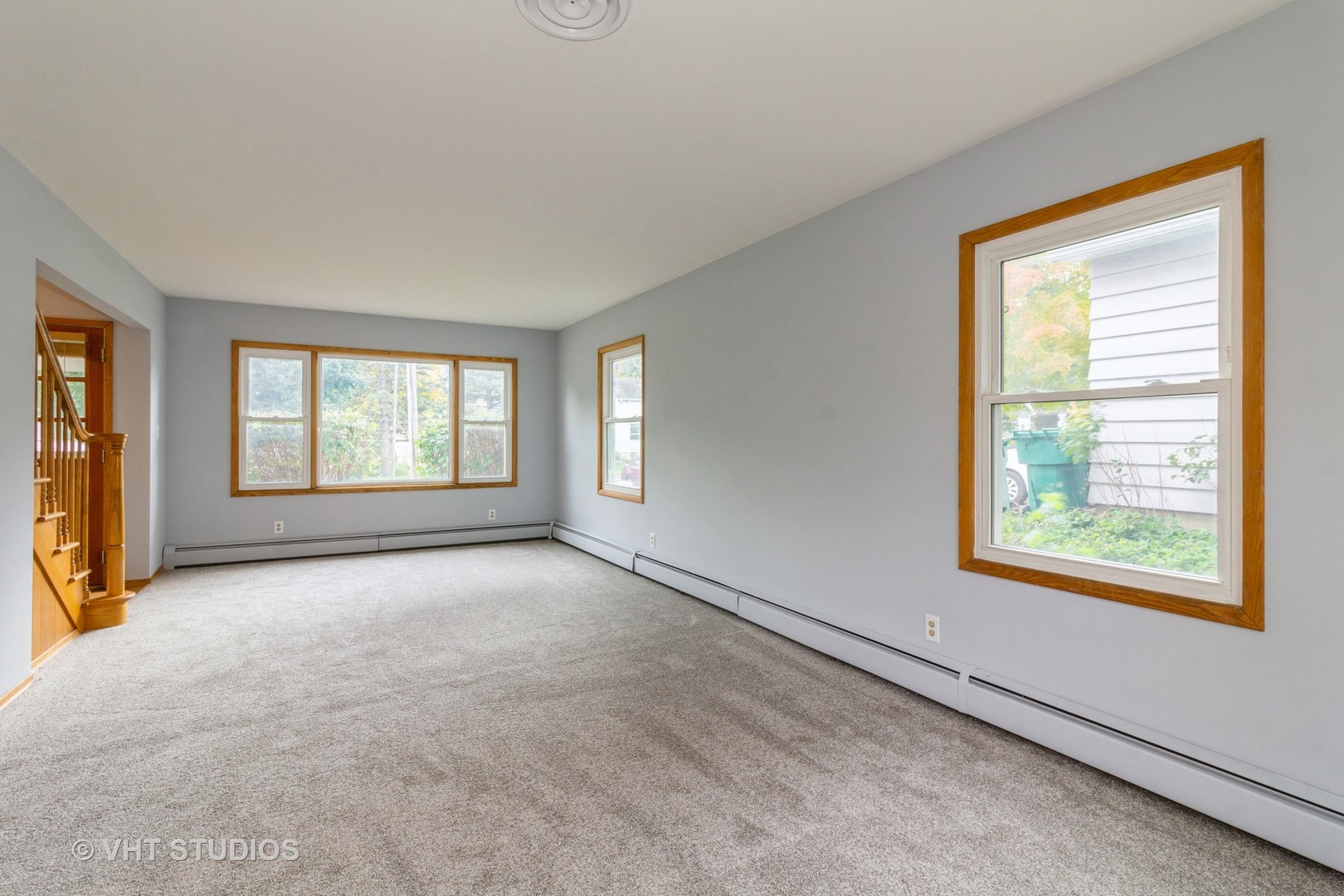 211 East Ottawa Street Sycamore, IL 60178 - Photo 4 of 33 an empty room with windows
