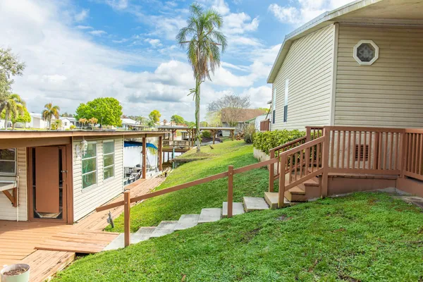 a view of a chairs and table on the wooden floor