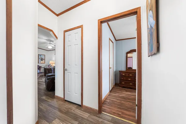 a spacious bathroom with a granite countertop tub sink and mirror