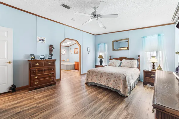 a view of a brick house with a large window