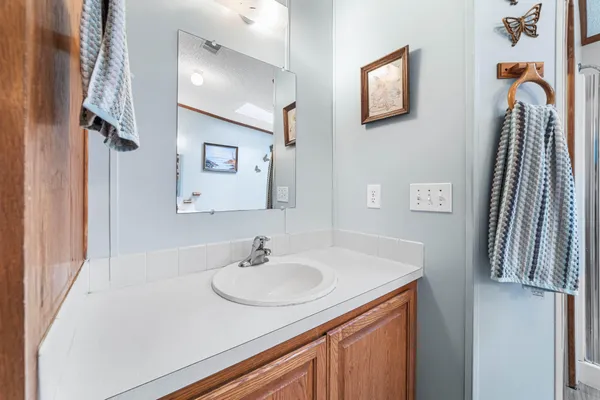 a view of a chairs and table in a patio