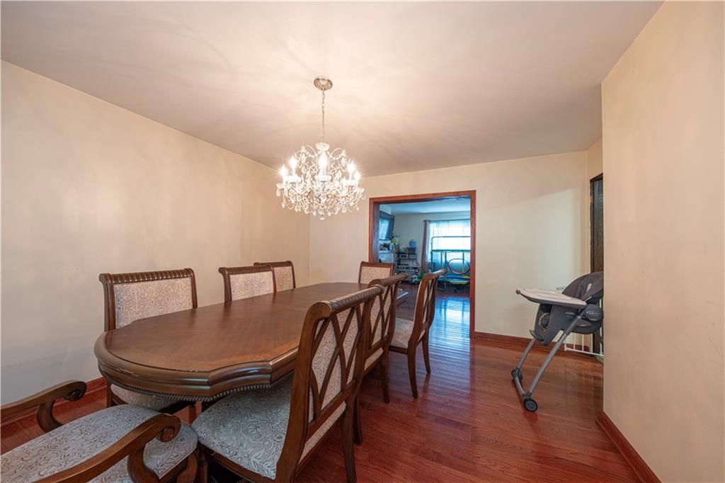 33 5th Street Pittsburgh, PA 15215 - Photo 7 of 32 a view of a dining room with furniture and chandelier