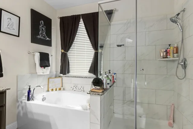 a bathroom with a sink and a bathtub