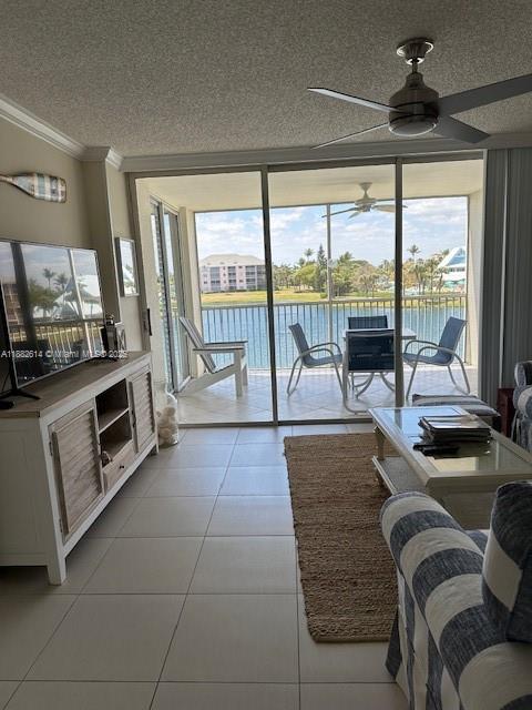 353 Highway 1, Unit C307 Jupiter, FL 33477 - Photo 11 of 12 a living room with a large window and a flat screen tv
