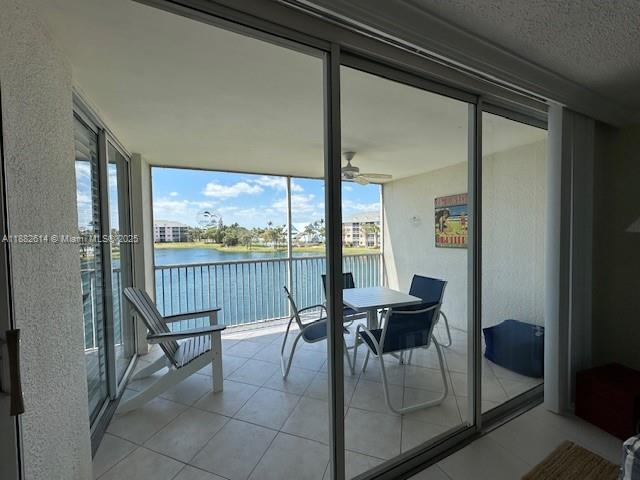 353 Highway 1, Unit C307 Jupiter, FL 33477 - Photo 6 of 12 a view of a dining room with furniture window and outside view