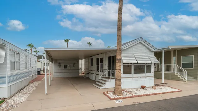 a view of house with outdoor space and seating area