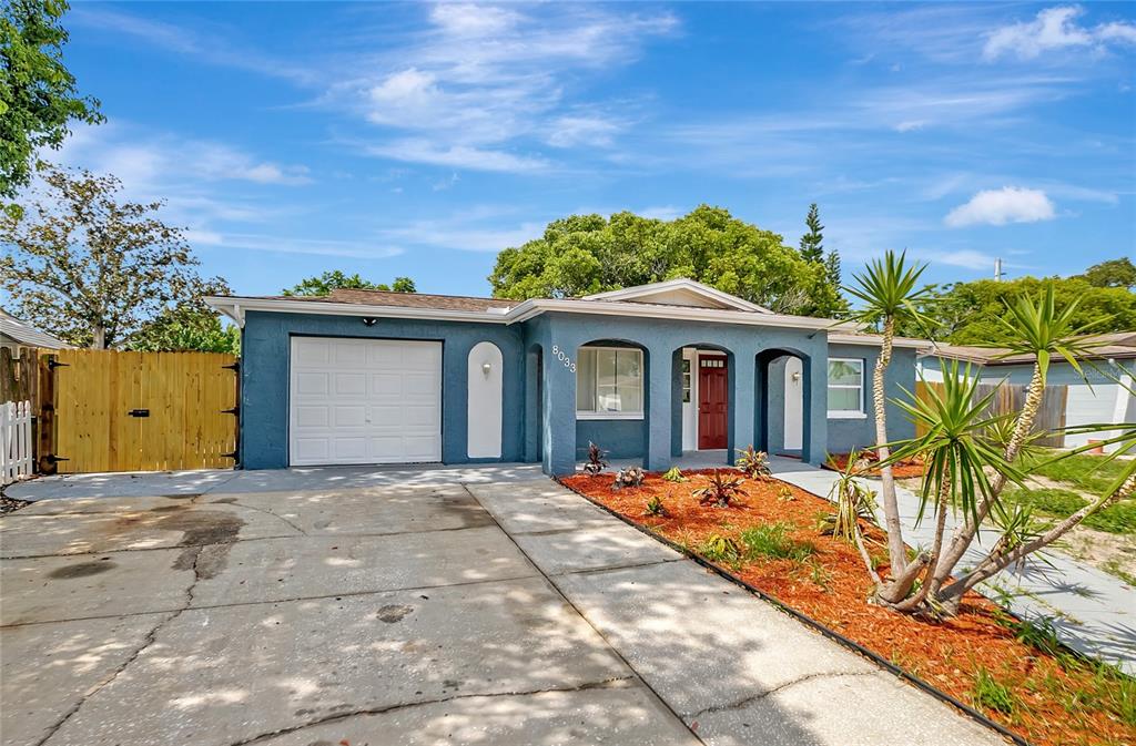 8033 Norwich Drive Port Richey, FL 34668 - Photo 1 of 1 a view of a house with a patio