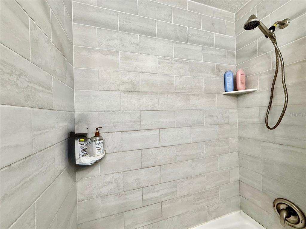 1363 Emporia Road Pierson, FL 32180 - Photo 15 of 27 a bathroom with a shower