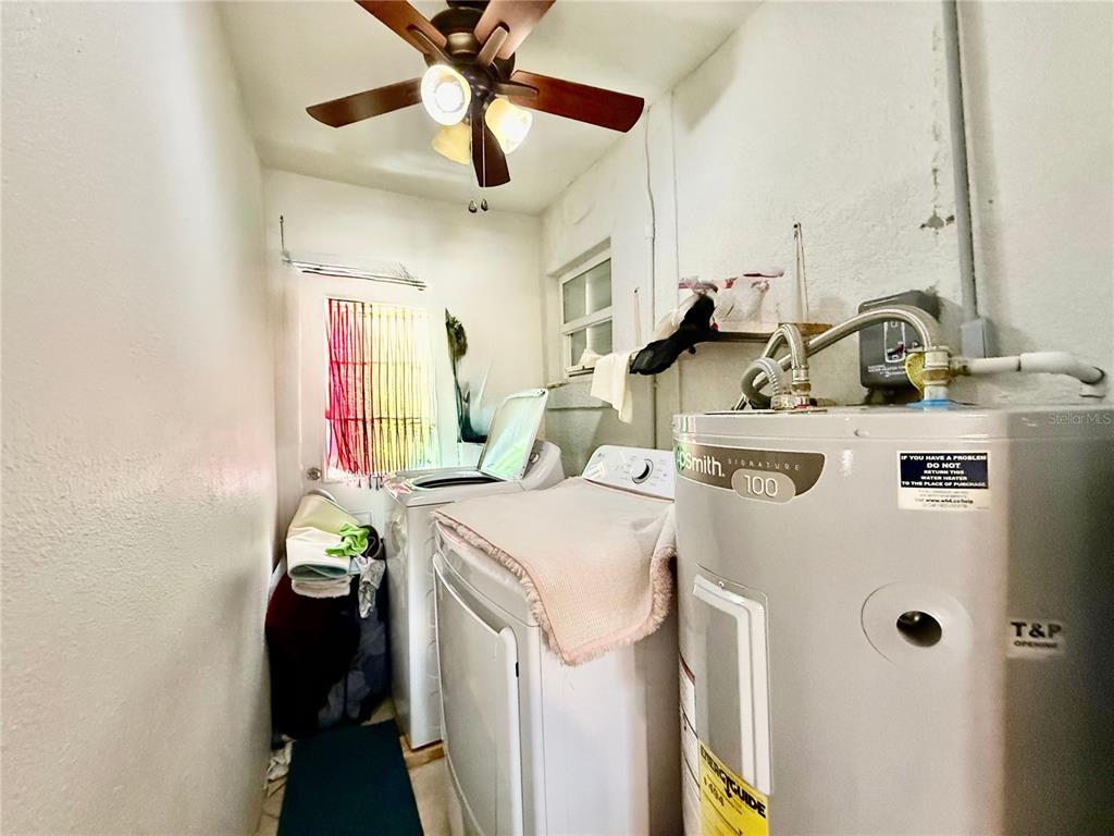 1363 Emporia Road Pierson, FL 32180 - Photo 22 of 27 a utility room with dryer and washer