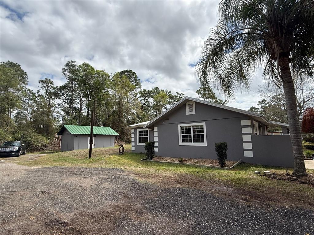 1363 Emporia Road Pierson, FL 32180 - Photo 26 of 27 a view of a house with a backyard