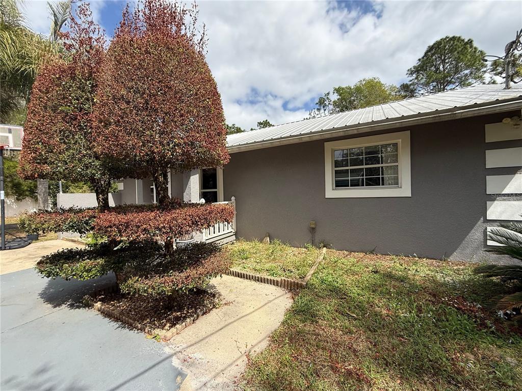 1363 Emporia Road Pierson, FL 32180 - Photo 5 of 27 a front view of a house with a yard