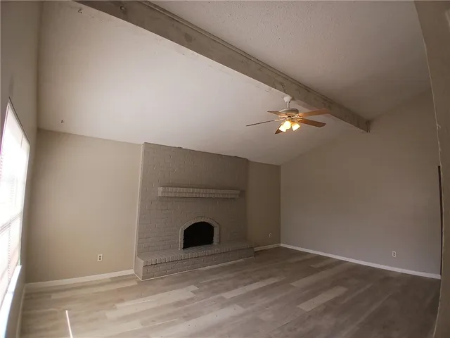 a view of livingroom with washer and dryer