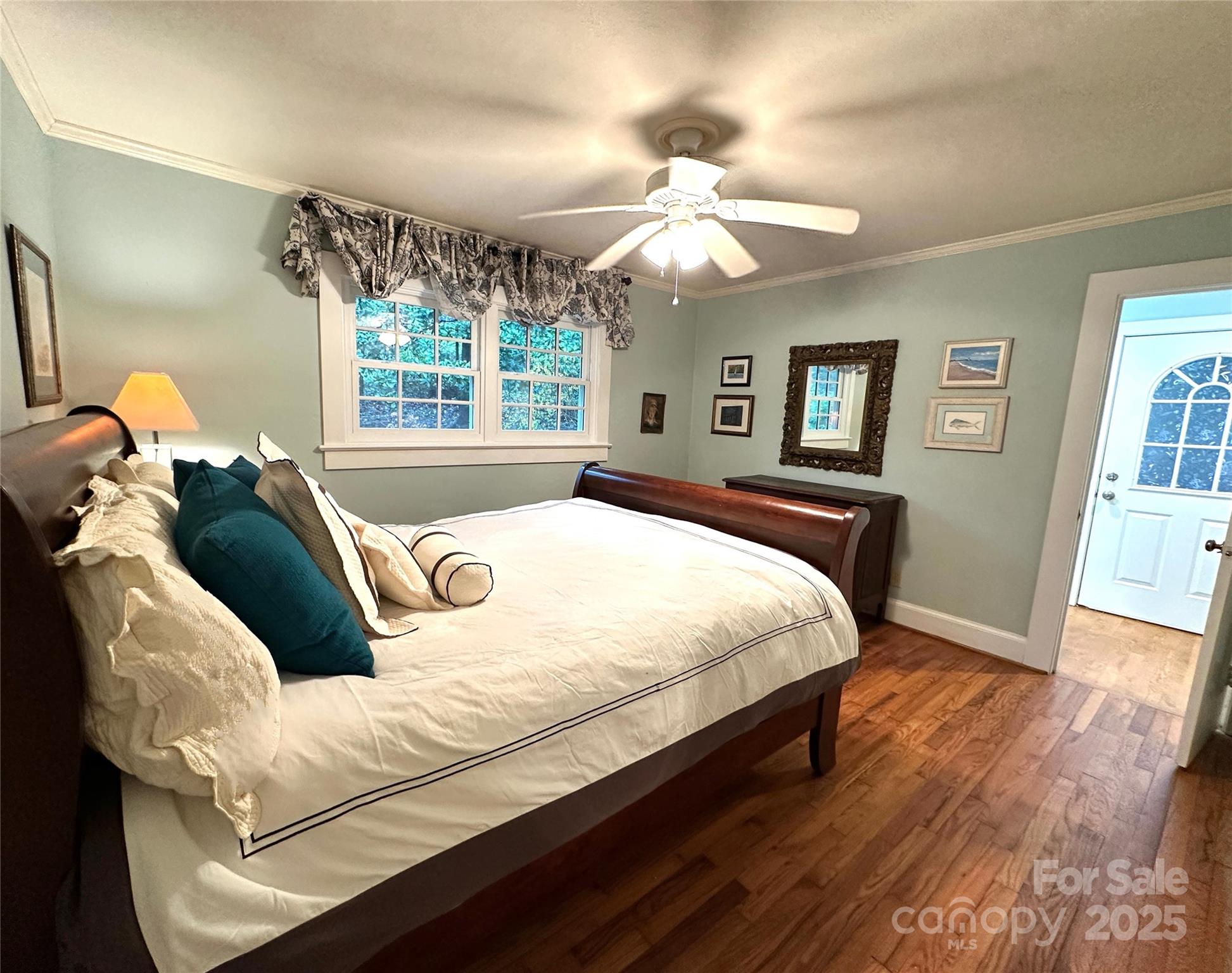 105 Melrose Lane Tryon, NC 28782 - Photo 12 of 35 a bedroom with a large bed and a window