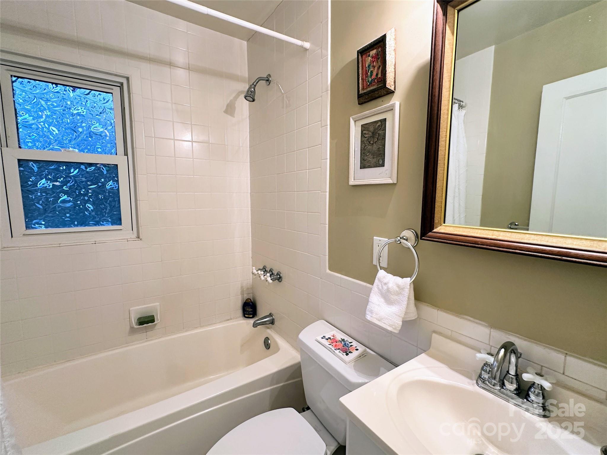 105 Melrose Lane Tryon, NC 28782 - Photo 16 of 35 a bathroom with a sink toilet and shower