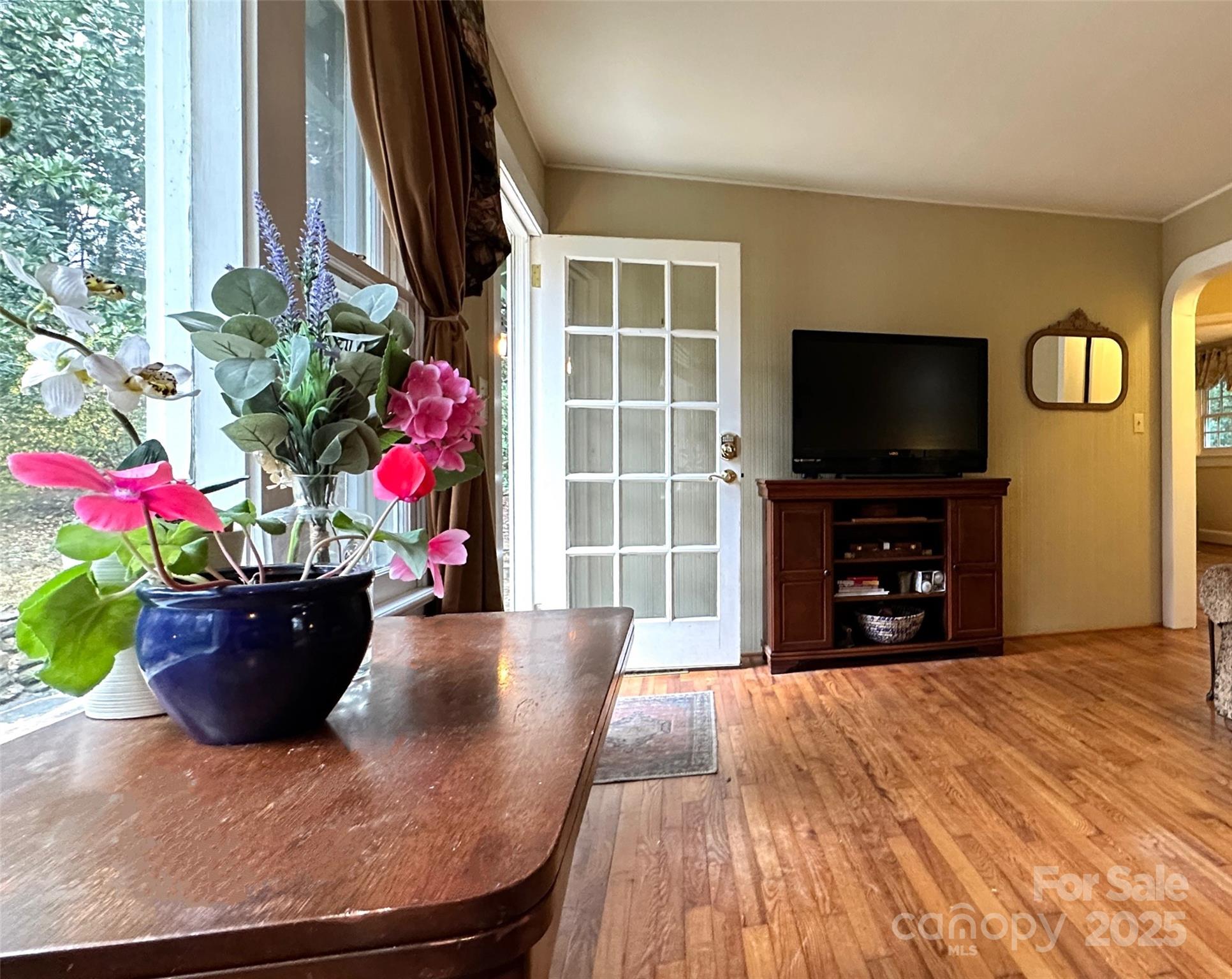 105 Melrose Lane Tryon, NC 28782 - Photo 24 of 35 a living room with furniture and a flat screen tv