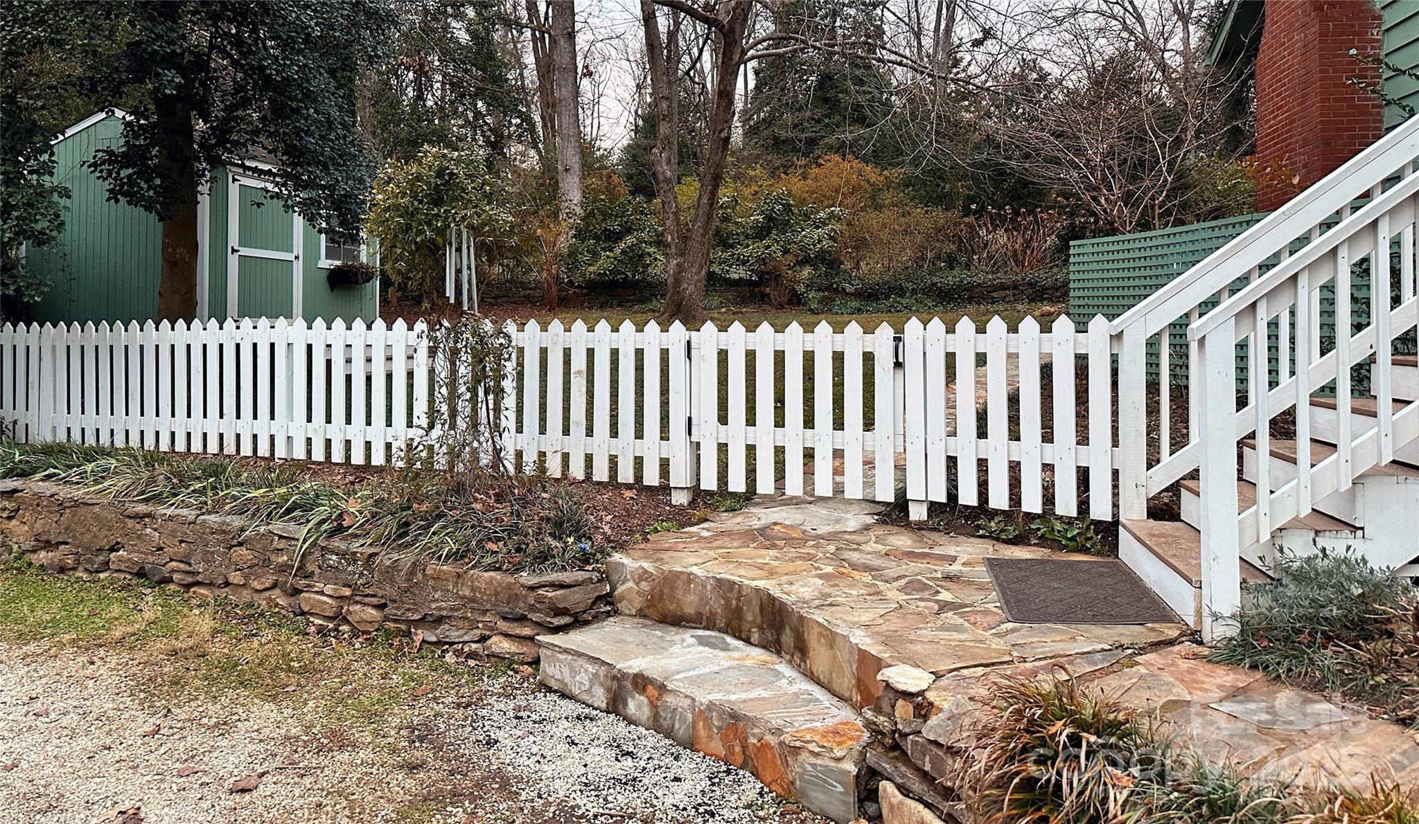 105 Melrose Lane Tryon, NC 28782 - Photo 30 of 35 a view of a bench in backyard