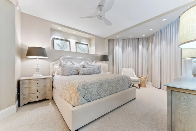 a large bathroom with a large tub and sink