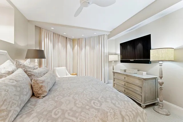 a en suite bathroom with a sink shower and a mirror