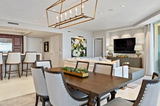a view of a dining room with furniture and a livingroom